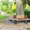 Baumbank aus Holz und Metall als Rundbank und Mehreckbank